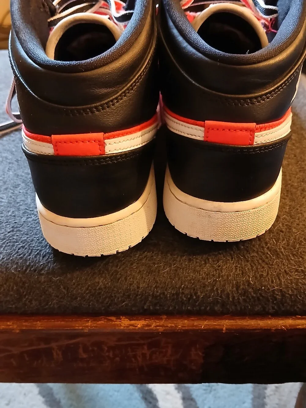 Nike Kids White and Orange High-Top Sneakers with Black Accents